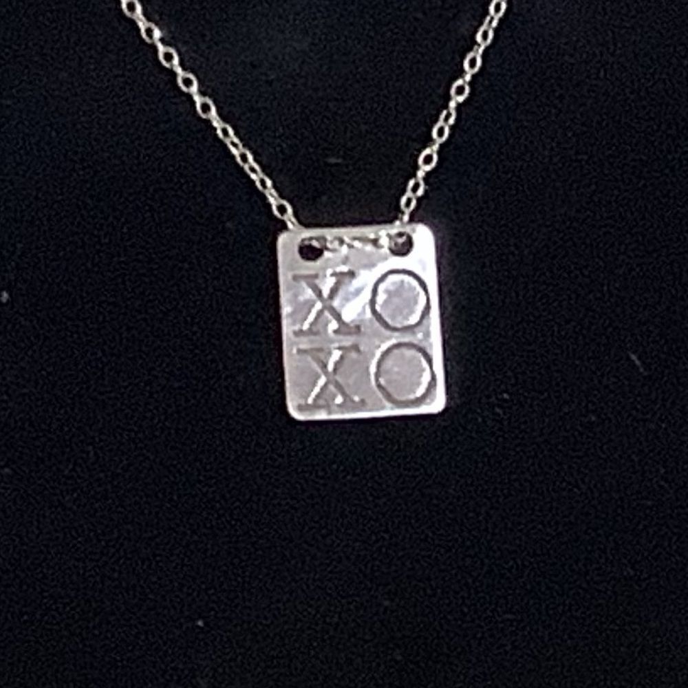 Miriam Merenfeld  XOXO tag necklace in sterling silver marked  925